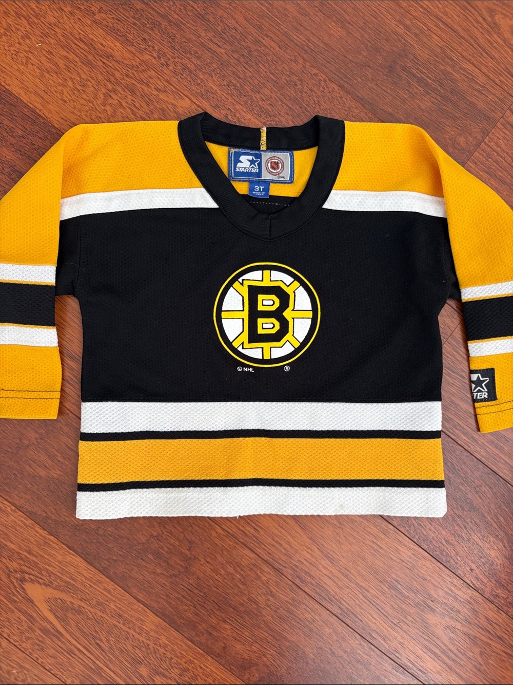 STARTER Black and Yellow Boston Bruins Youth Hockey Top